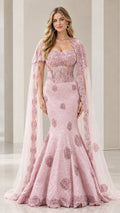 Front view of woman wearing Dusty Rose mermaid evening gown with sheer cape sleeves and floral lace bodice