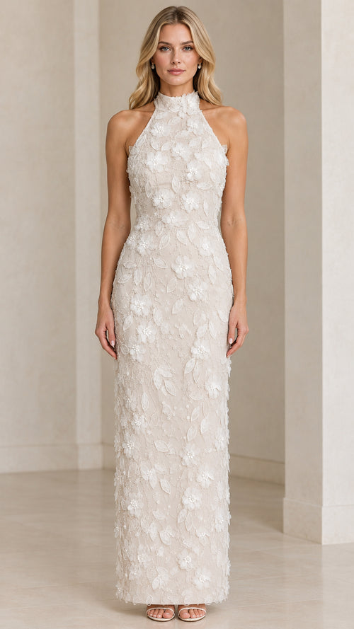Front view of model wearing Ivory 3D floral applique halter maxi evening dress