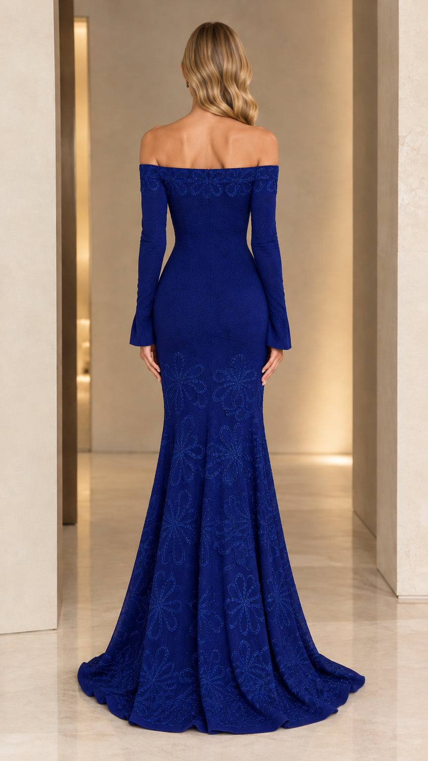 Back view of royal blue long-sleeve floor-length evening gown