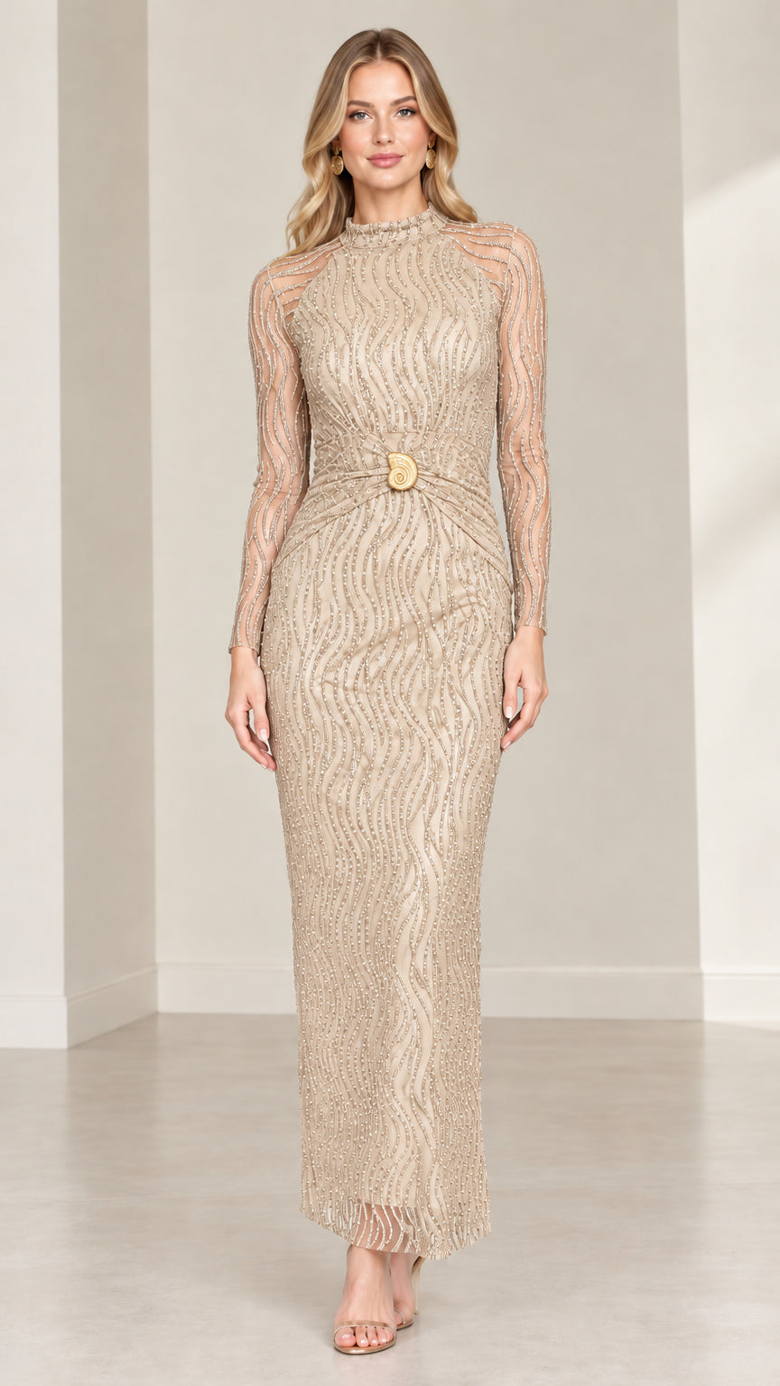Front view of model wearing champagne metallic embellished maxi dress